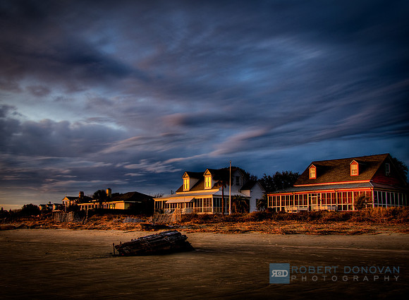 Sullivans Houses at sunset before storm